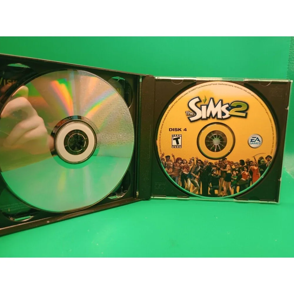 The Sims 2 (PC, 2004) Complete CIB 4 Disc Game Very Good Condition